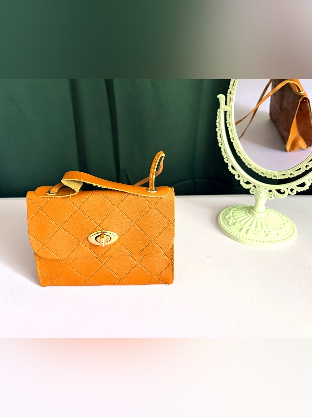 Small brown crossbody bag. Buy One GET one Free on all
Items.
